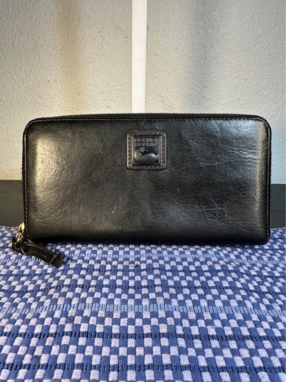 Dooney & Bourke Florentine Large Zip Around Wallet black vachetta leather
